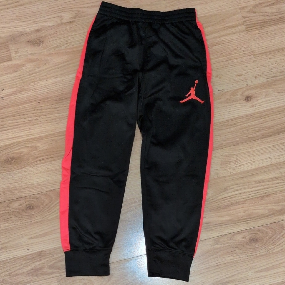 Jordan Kids Black Sweatpants with Bright Red-Orange Accents